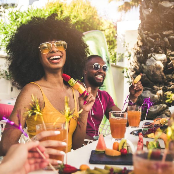 Multiracial,Group,Of,Friends,Having,Fun,At,Backyard,Home,Party