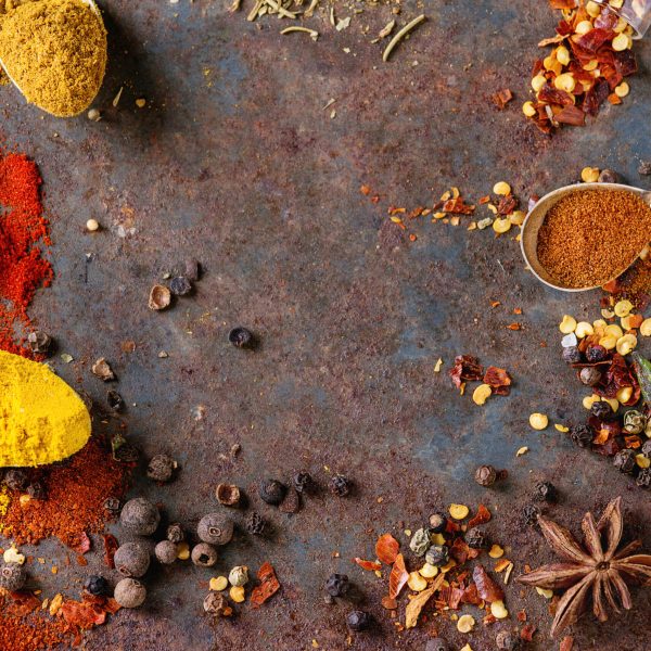 Spicy,Background,With,Assortment,Of,Different,Hot,Chili,And,Allspice